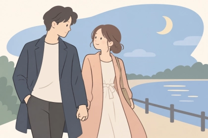 夕暮れの川辺で、自然体で寄り添う男女